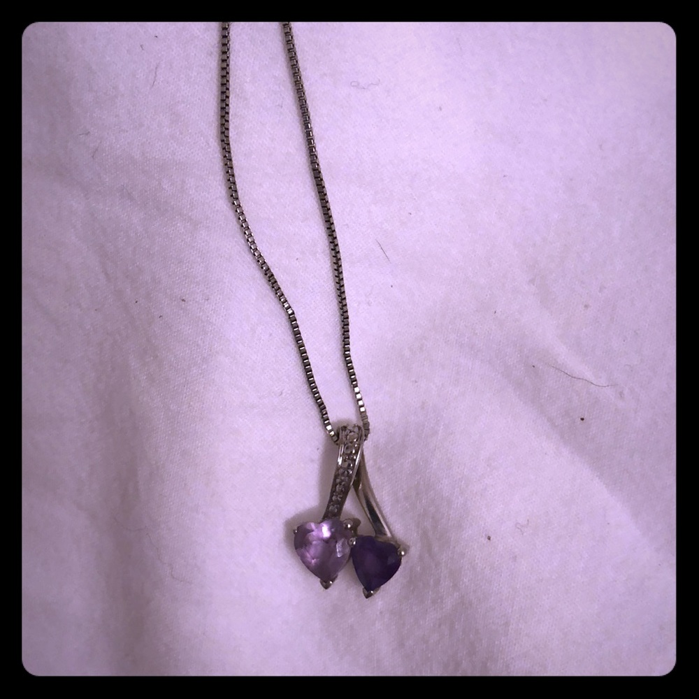 Silver necklace with purple stones